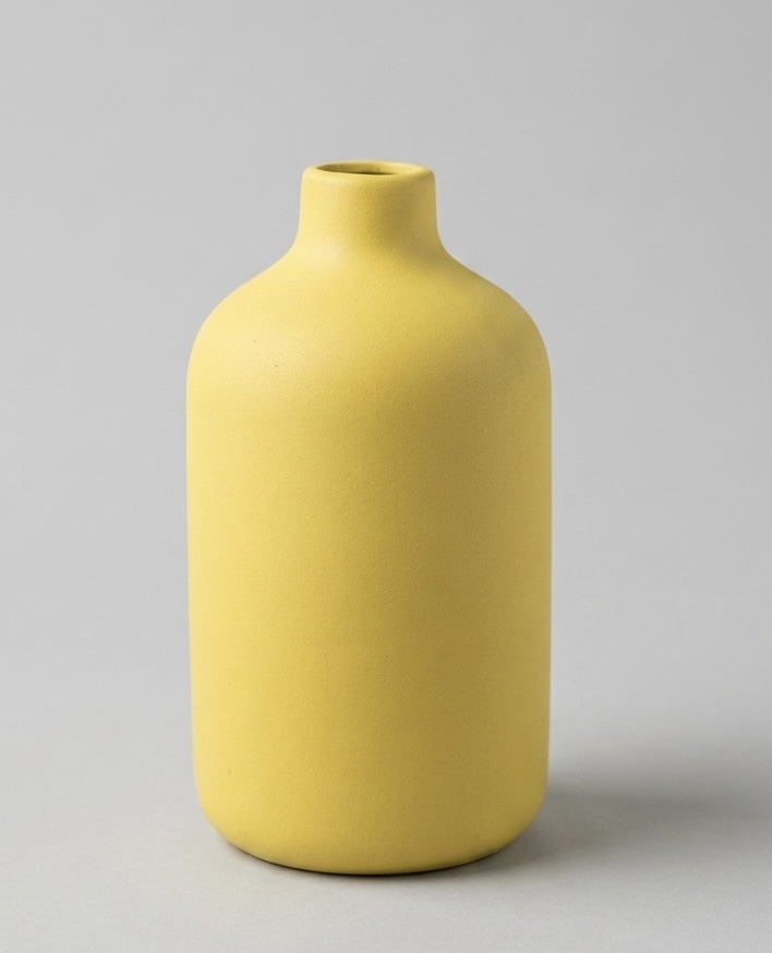 yellow ceramic vase